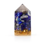 Crystal tower with blue and gray stones on a white background