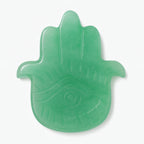 Green jade Hamsa hand on a white background