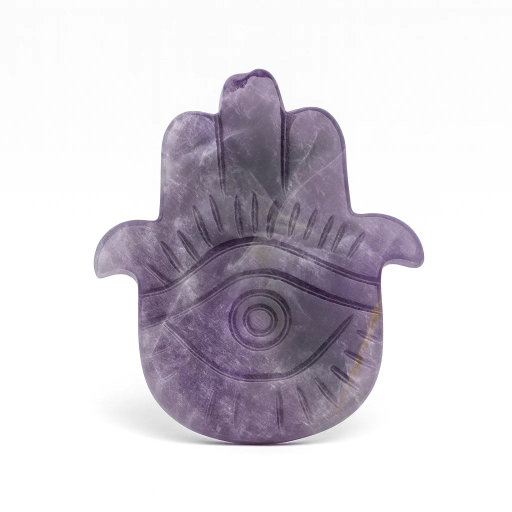 Purple Hamsa hand amulet on a white background