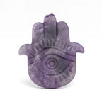 Purple Hamsa hand amulet on a white background