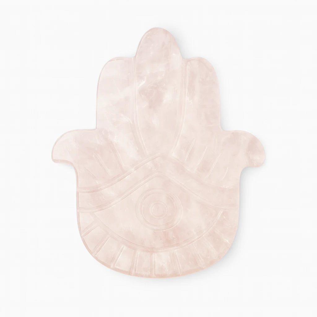 Pink marbled Hamsa hand-shaped object on a white background
