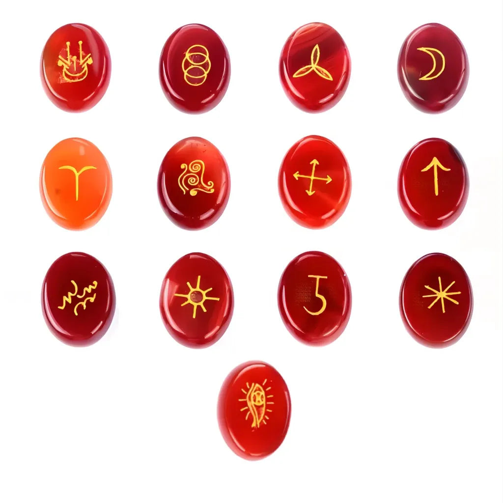 Red stones with gold symbols arranged in a grid on a white background