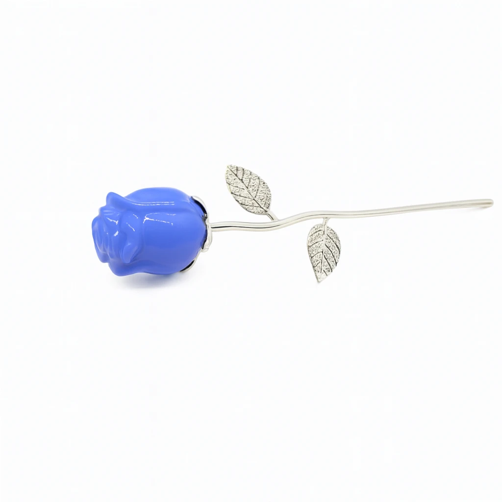 Blue rose-shaped brooch with silver leaves on a white background