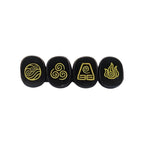 Four black stones with gold symbols on a white background