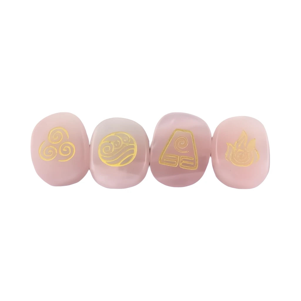 Four pink stones with gold symbols on a white background