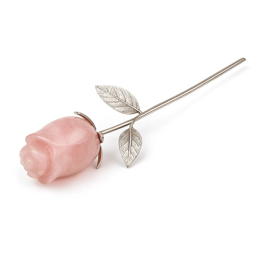 Pink rose with silver stem and leaves on a white background