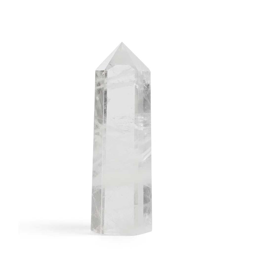 Clear crystal tower on a white background
