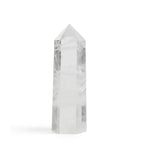 Clear crystal tower on a white background