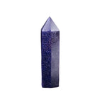 Crystal tower with blue and purple speckled pattern on a white background