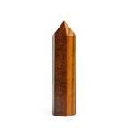 Tiger eye crystal tower on a white background