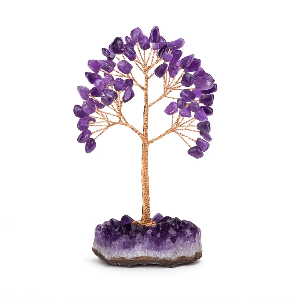 Amethyst crystal tree on a purple crystal base with a white background