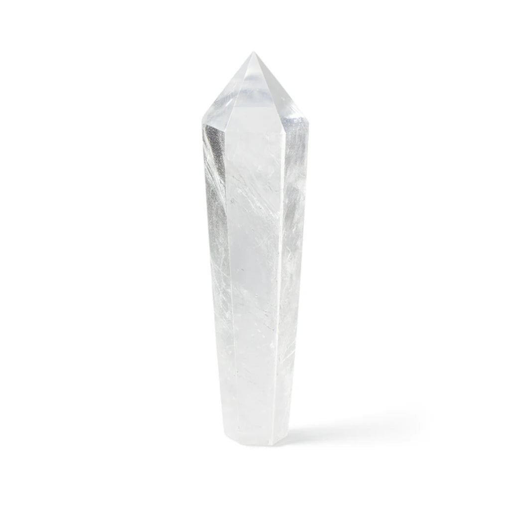 Clear crystal tower on a white background