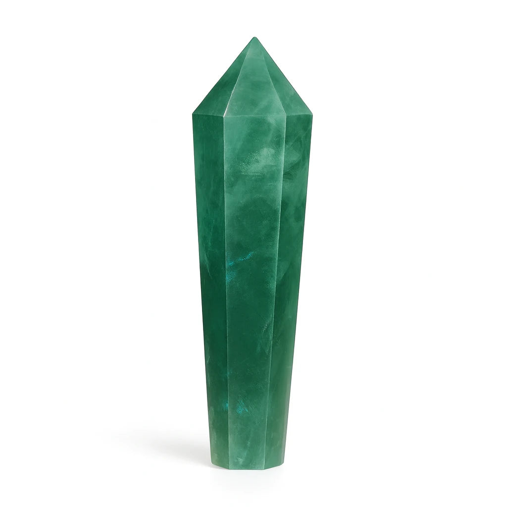 Green crystal tower on a white background