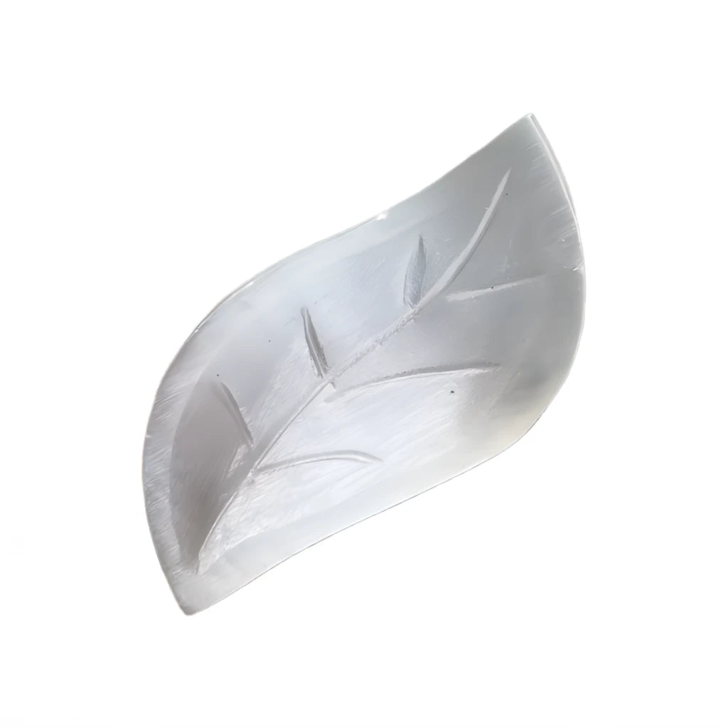 White leaf-shaped crystal on a white background
