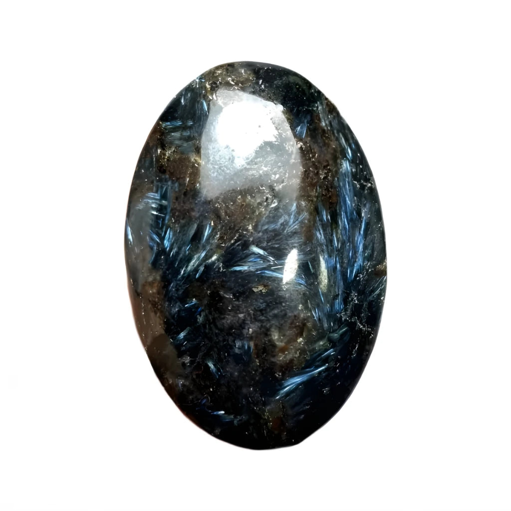 Oval-shaped crystal stone with blue and black patterns on a white background
