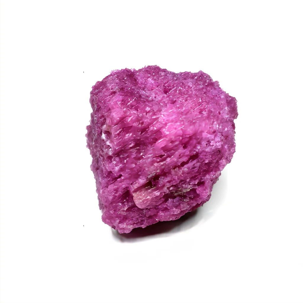 Pink crystal with small hollow holes on a white background