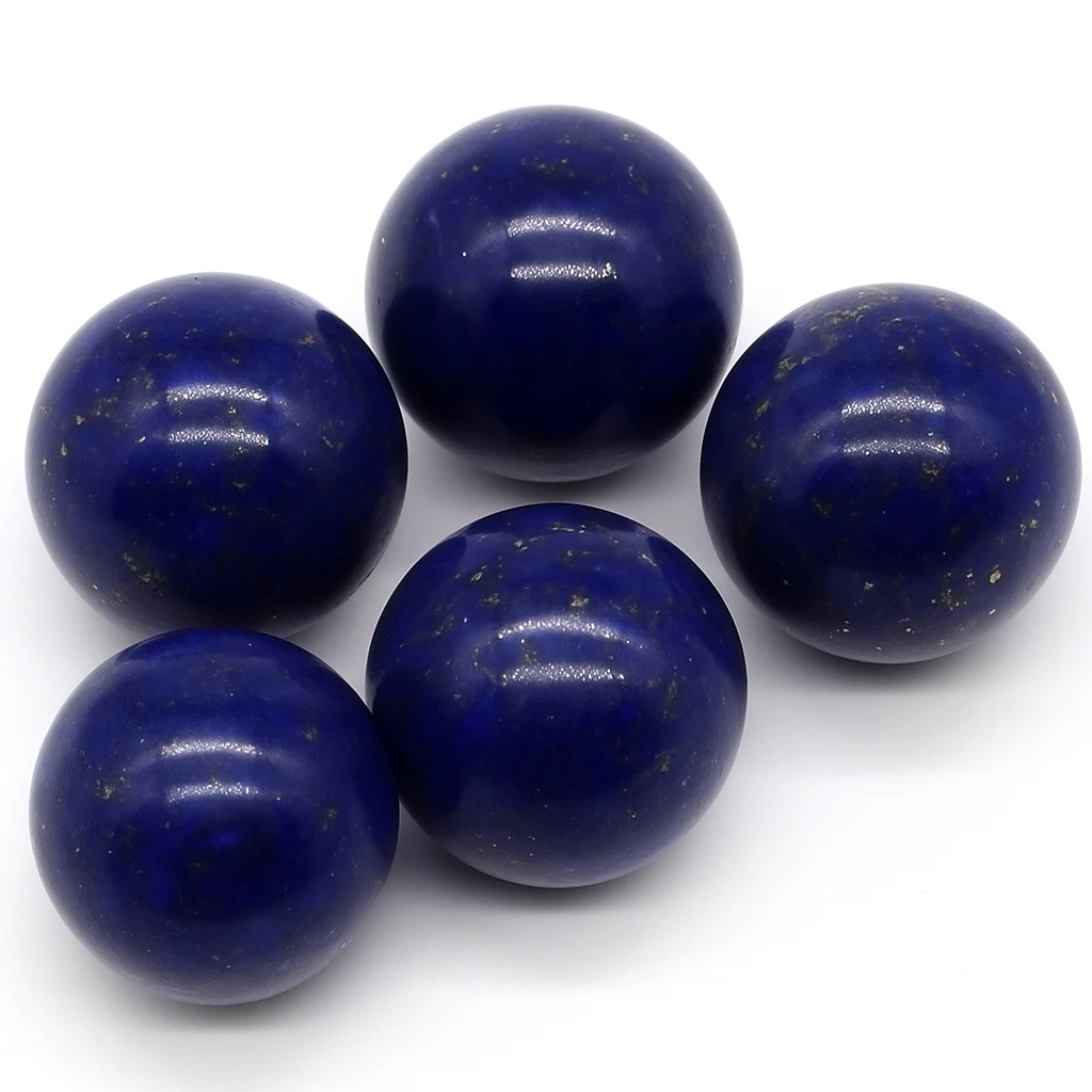 Five blue marbles on a white background
