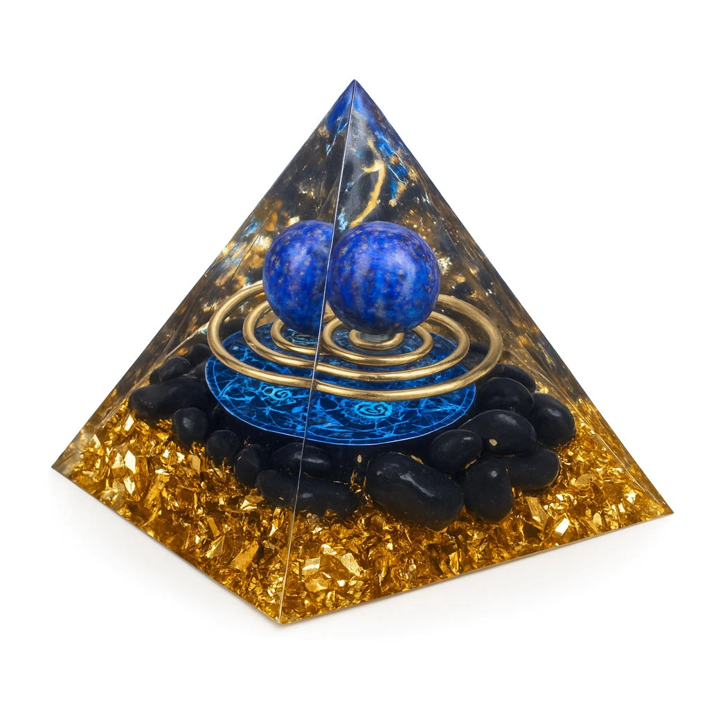 Pyramid-shaped crystal with blue balls and gold accents on a white background