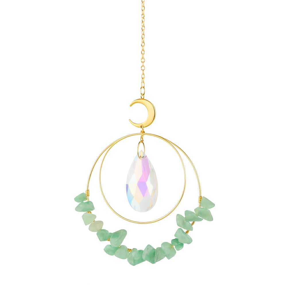 Jewelry with a teardrop-shaped gemstone and green beads on a white background