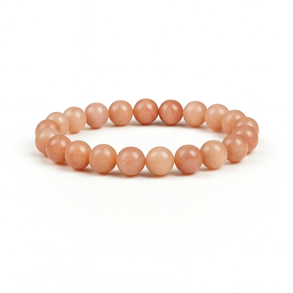 Orange beaded bracelet on a white background