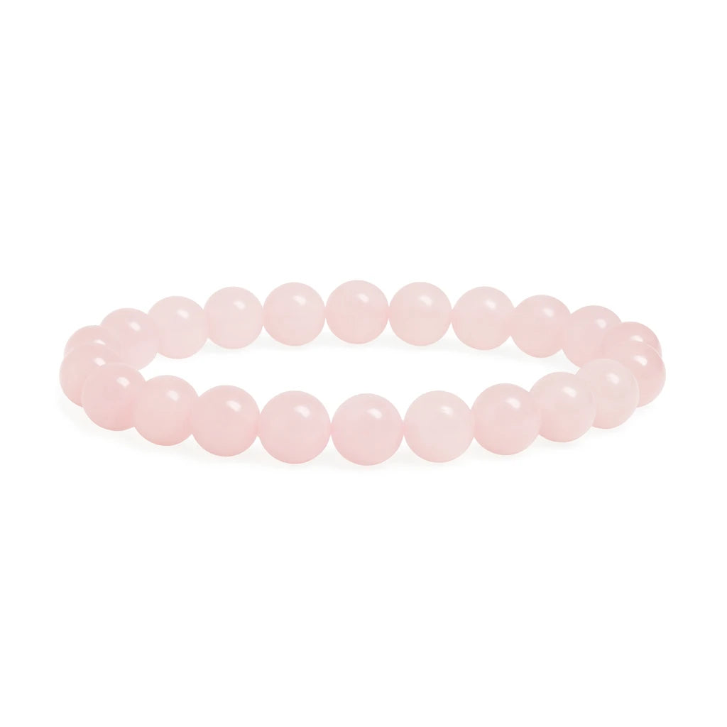 Pink beaded bracelet on a white background