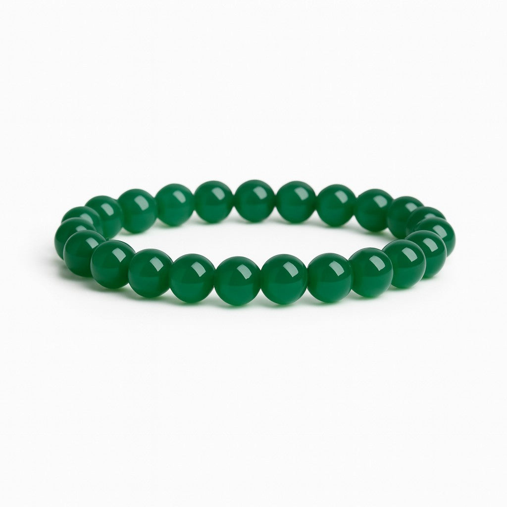 Green beaded bracelet on a white background