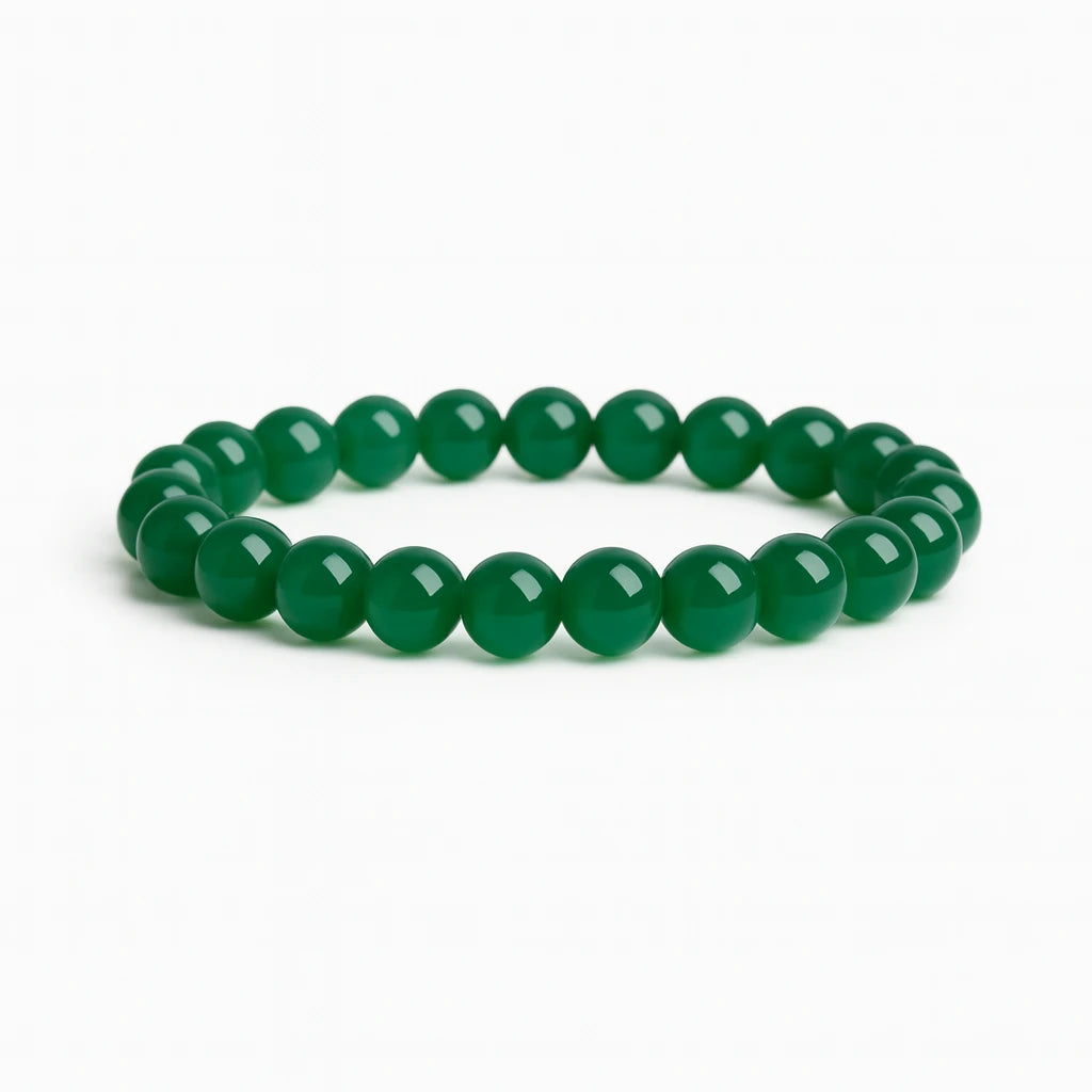 Green beaded bracelet on a white background