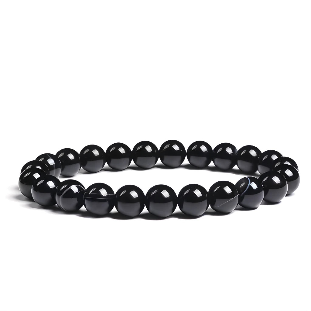 Black beaded bracelet on a white background