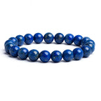 Blue beaded bracelet on a white background