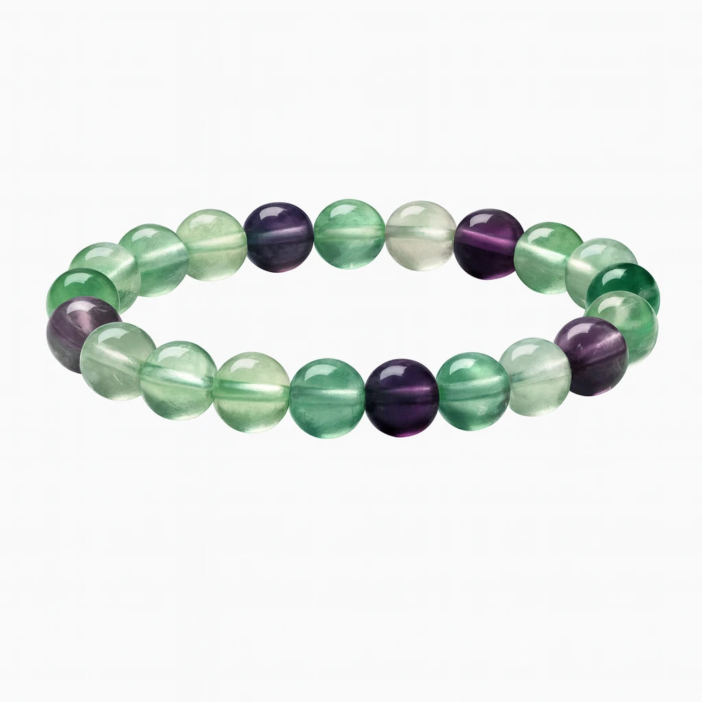 Beaded bracelet with green and purple beads on a white background