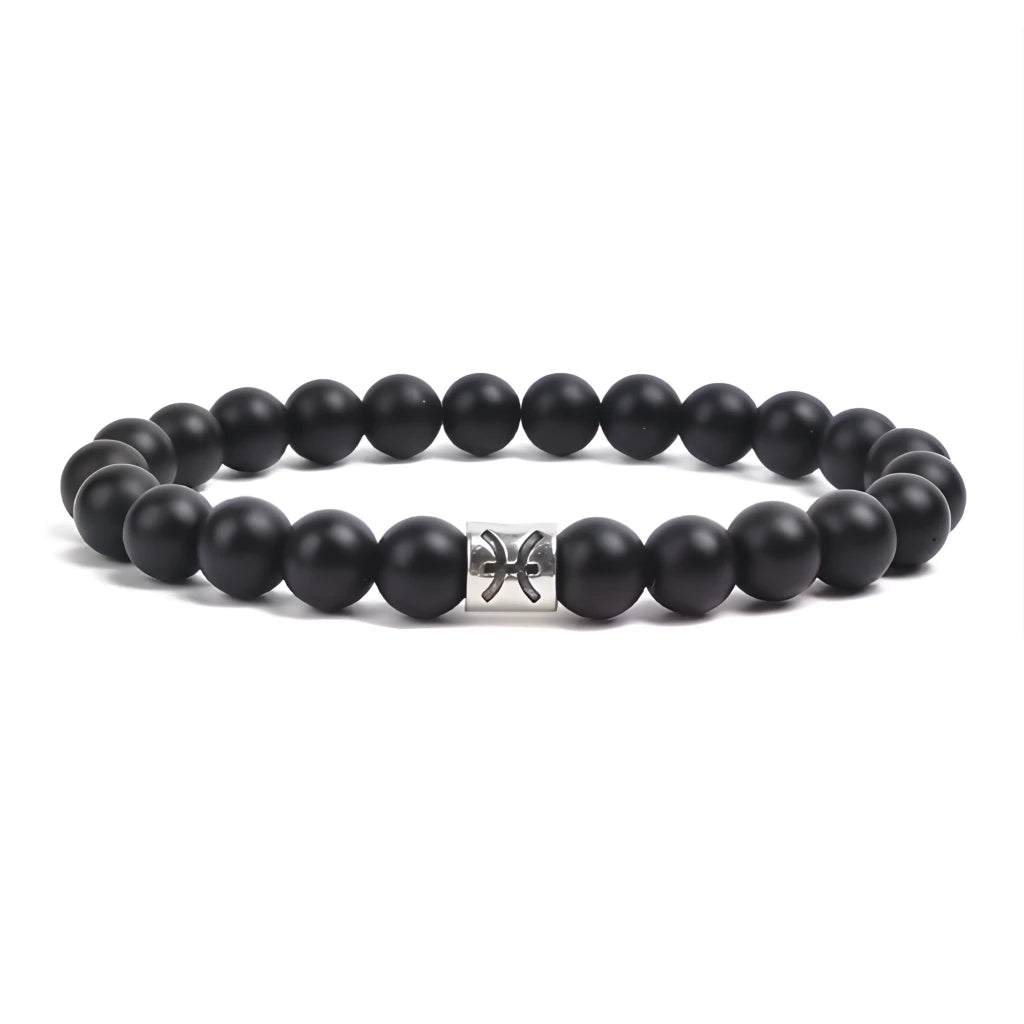 Black beaded bracelet with a silver clasp on a white background