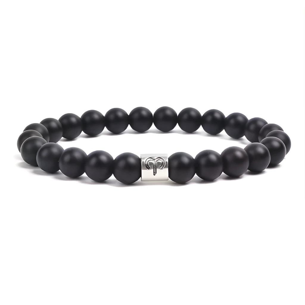 Black beaded bracelet with a silver clasp on a white background