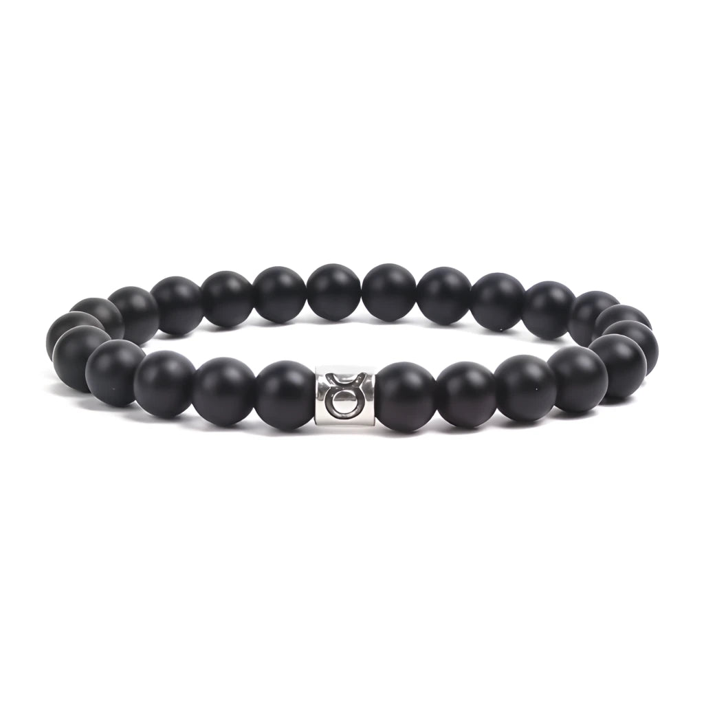 Black beaded bracelet with a silver clasp on a white background