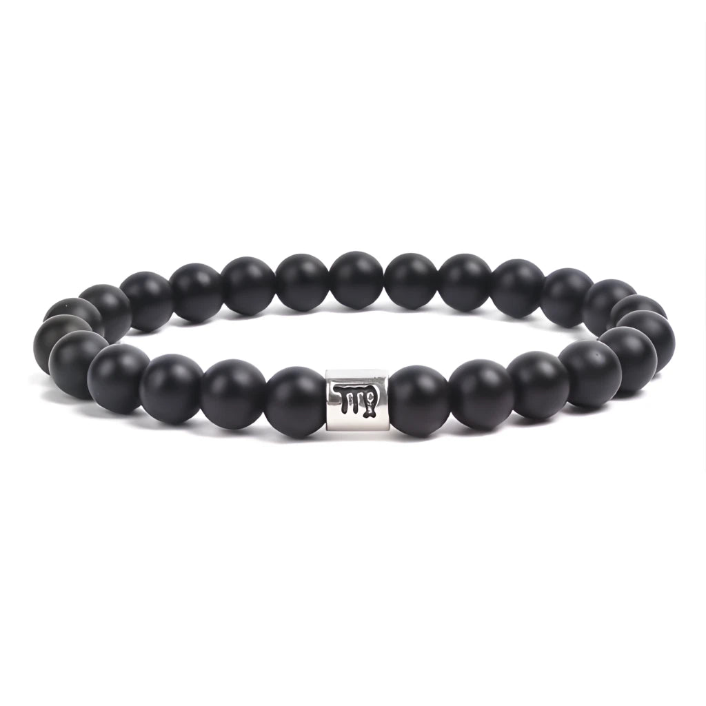 Black beaded bracelet with a silver clasp on a white background