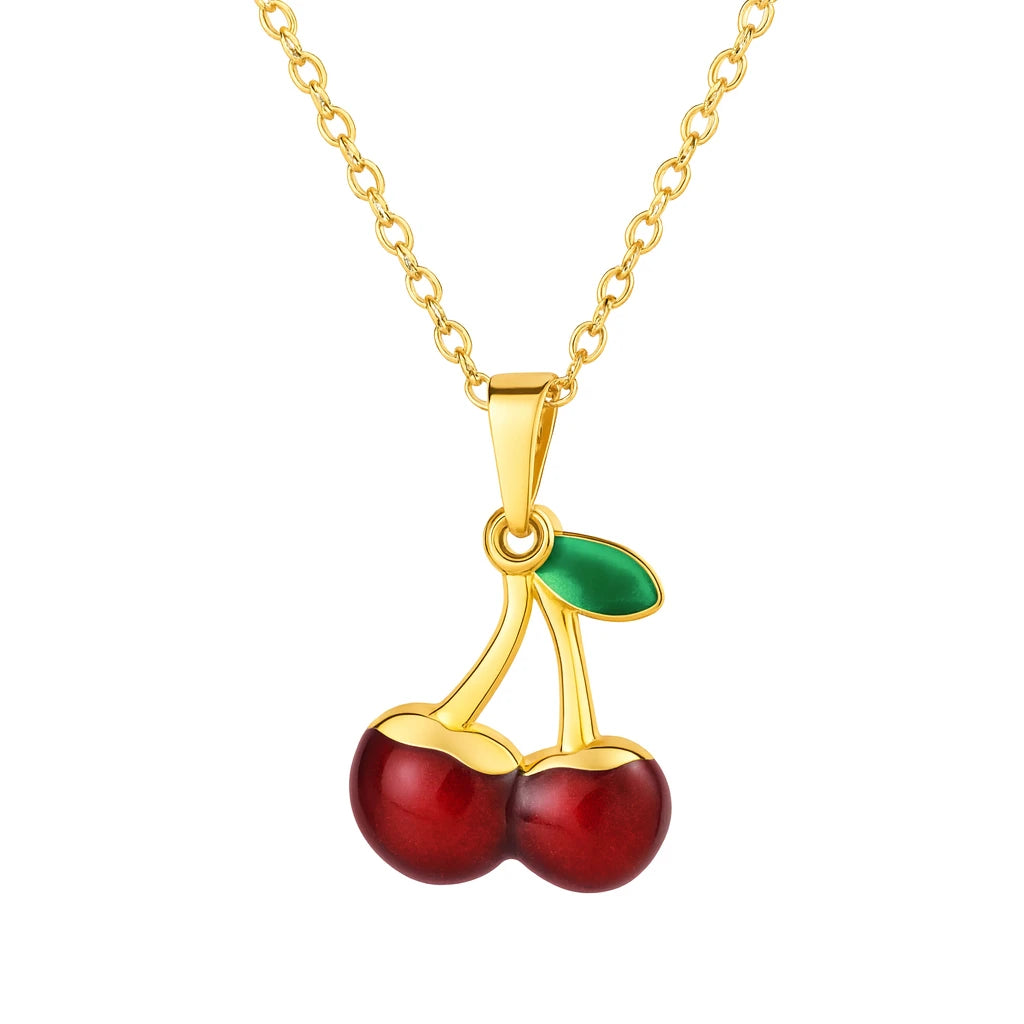 Gold necklace with a flat cherry pendant on a white background
