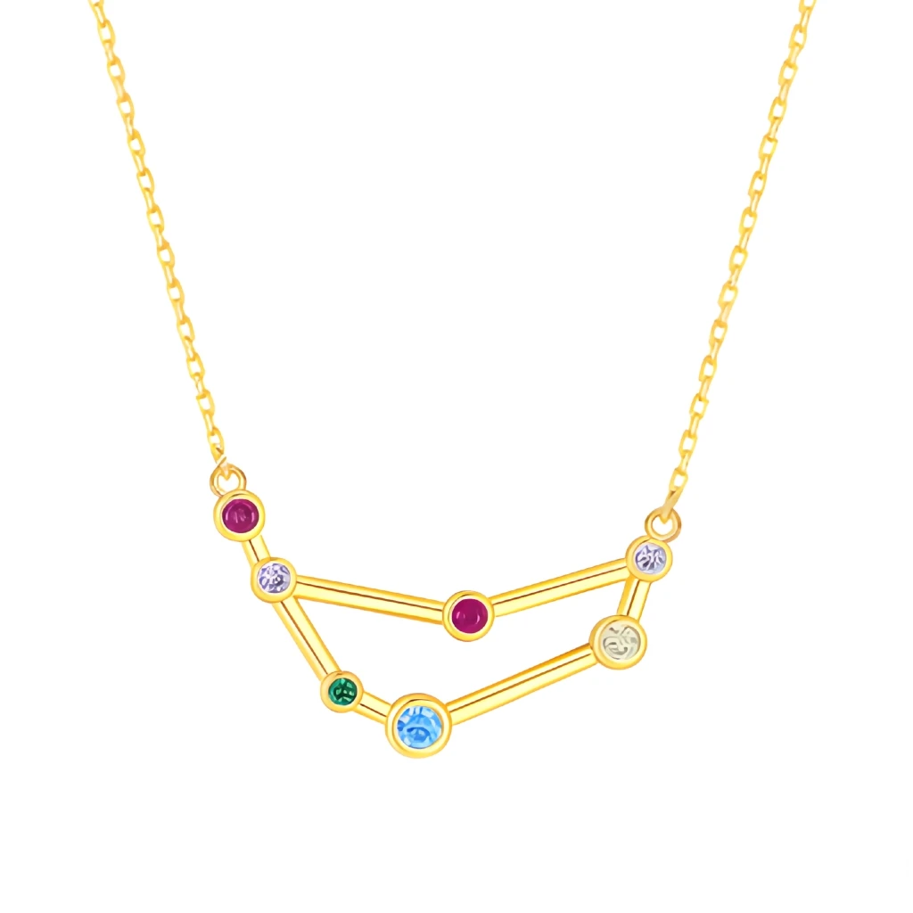 Gold necklace with a zodiac sign pendant featuring colorful gemstones on a white background