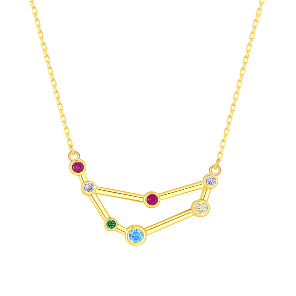 Gold necklace with a zodiac sign pendant featuring colorful gemstones on a white background