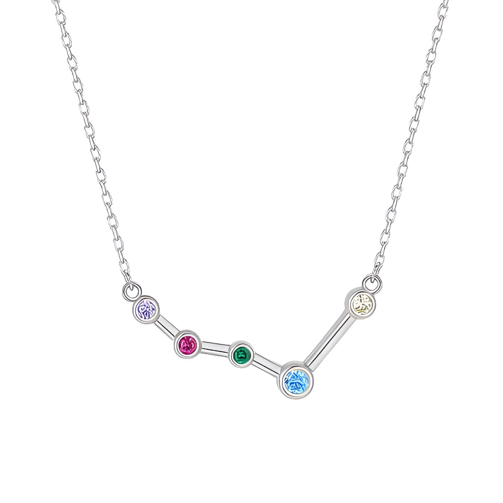 Silver necklace with a zodiac sign pendant featuring colorful gemstones on a white background