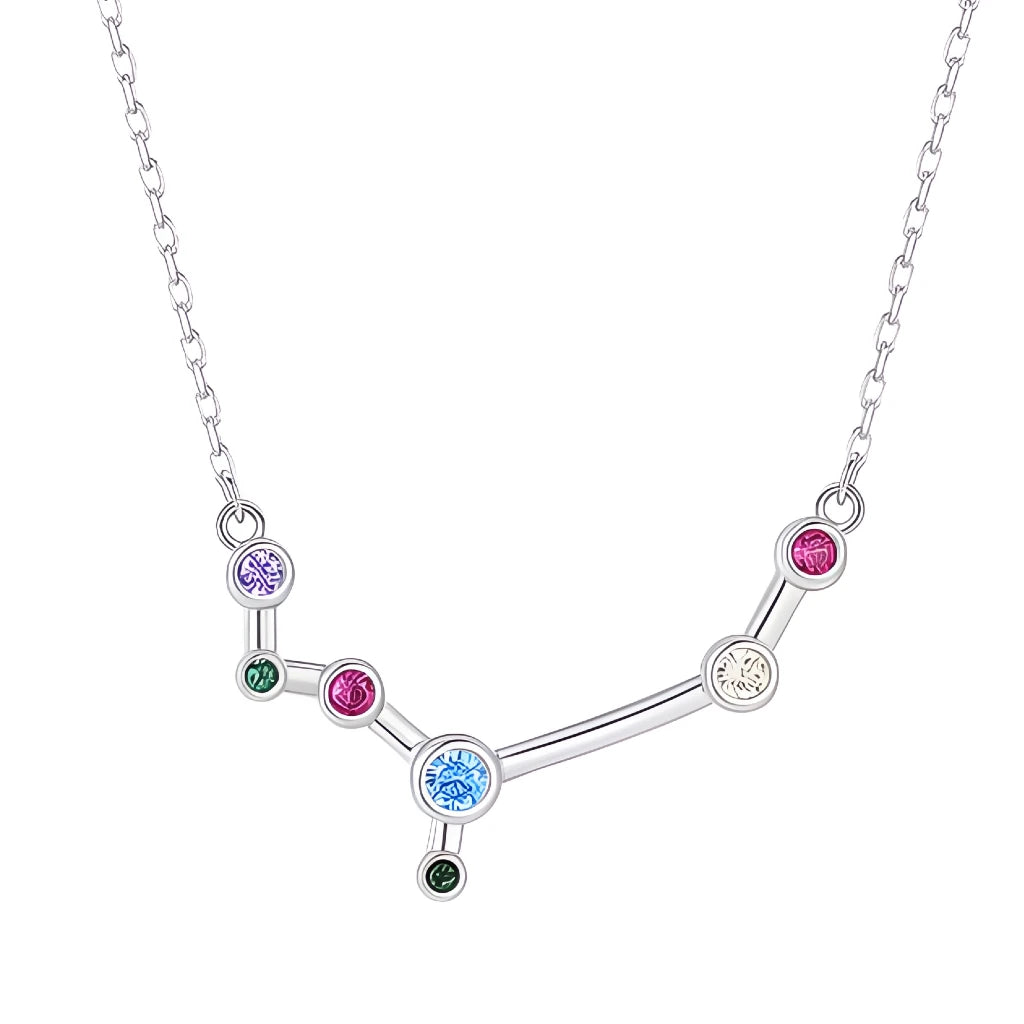 Silver necklace with a zodiac sign pendant featuring colorful gemstones on a white background