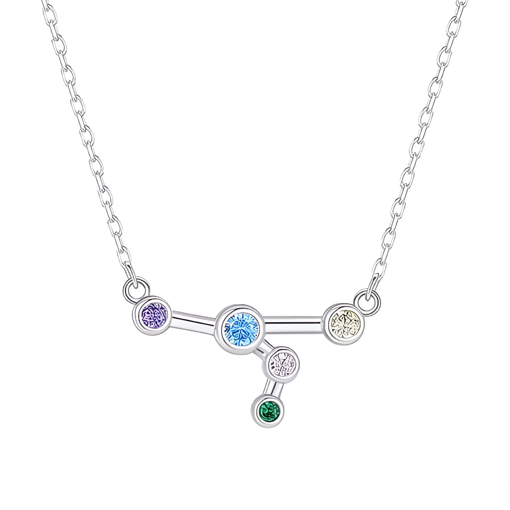 Silver necklace with a zodiac sign pendant featuring colorful gemstones on a white background