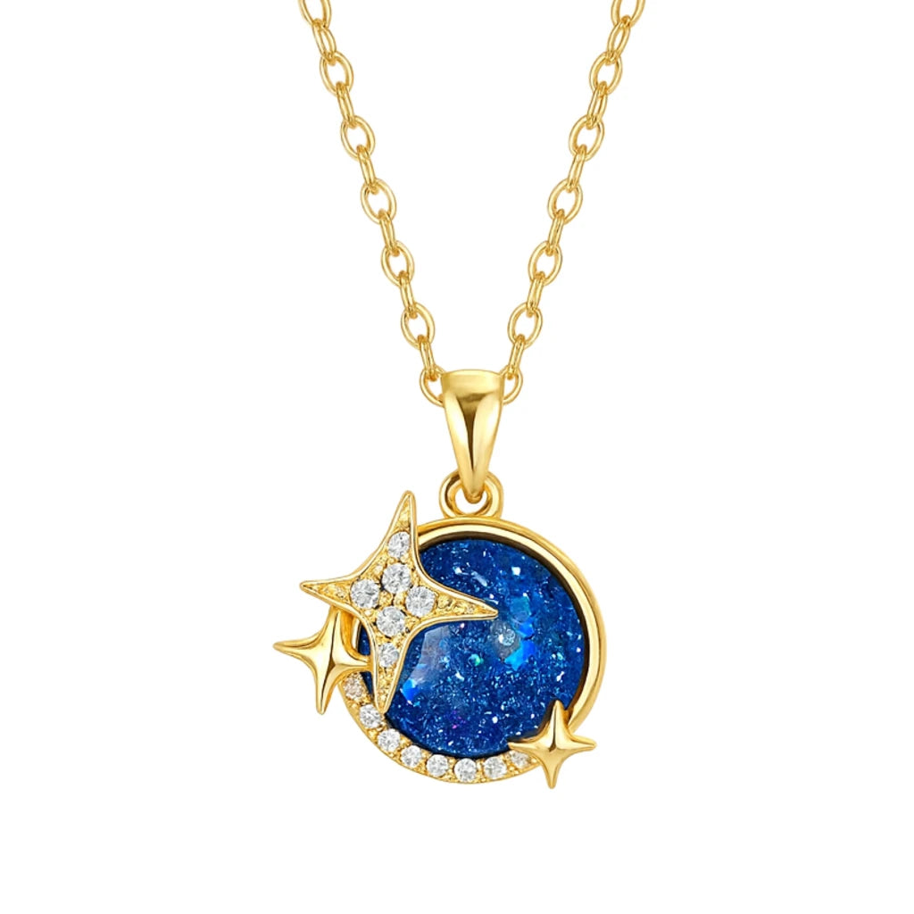 Gold necklace with a blue pendant on a white background