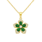 Gold necklace with a green five-leaf clover pendant on a white background