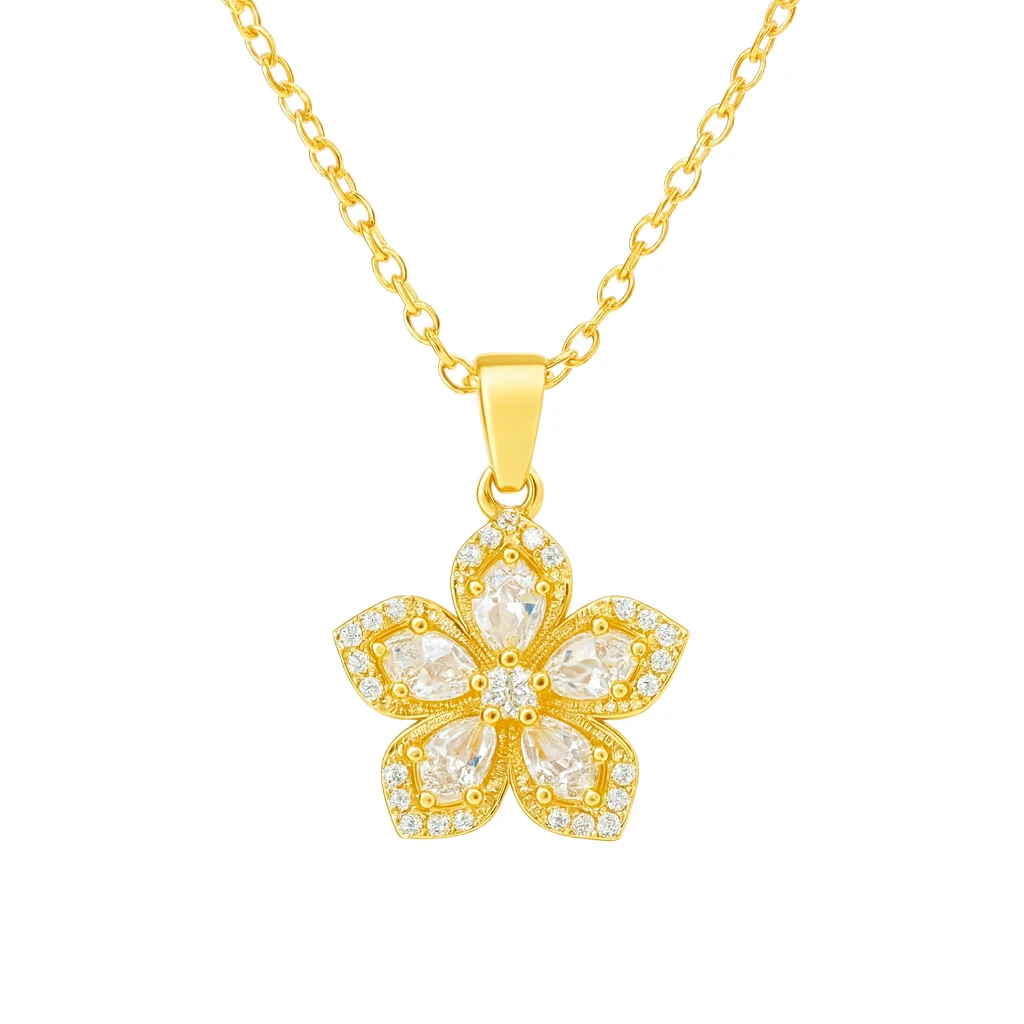 Gold necklace with a floral pendant on a white background