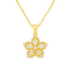 Gold necklace with a floral pendant on a white background
