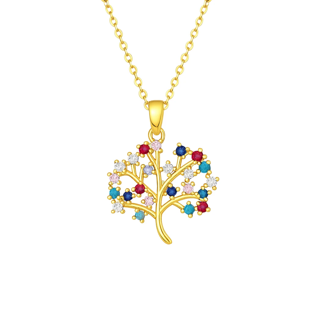 Gold necklace with a tree-shaped pendant featuring colorful gemstones on a white background