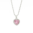 Silver necklace with a pink heart-shaped pendant on a white background