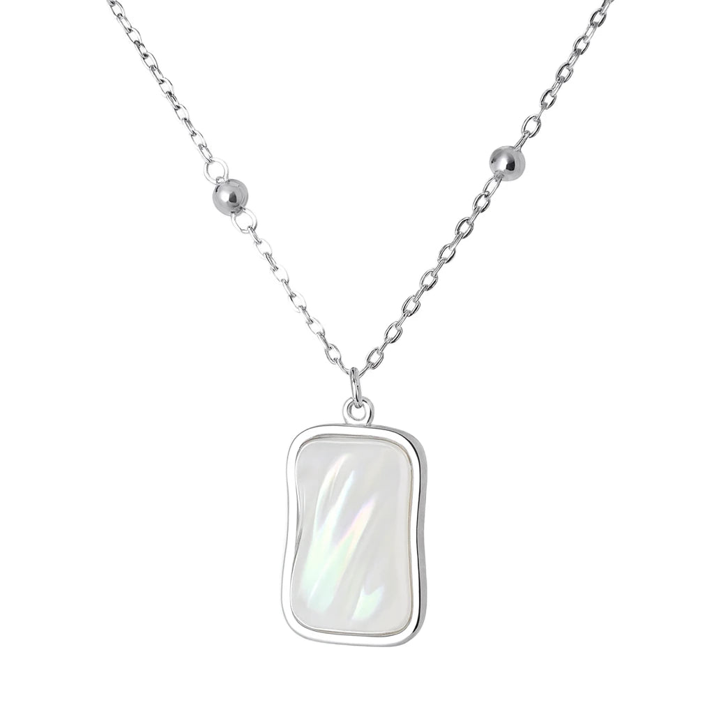 Silver necklace with a rectangular pendant on a white background
