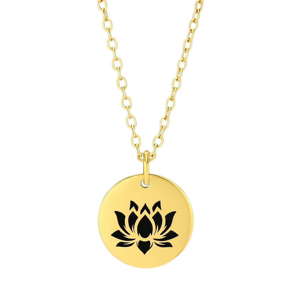 Gold necklace with a black lotus flower pendant on a white background