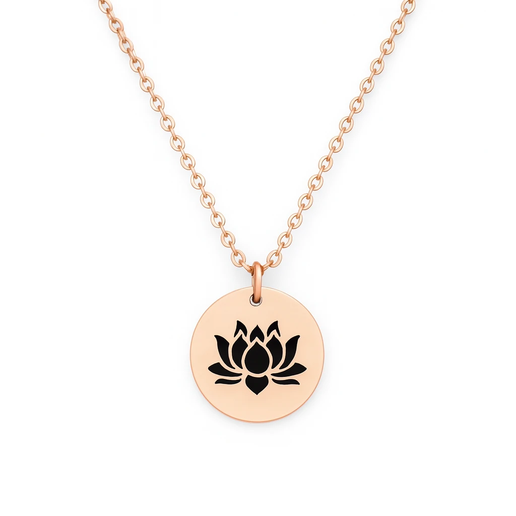 Rose gold necklace with a black lotus flower pendant on a white background