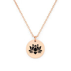 Rose gold necklace with a black lotus flower pendant on a white background